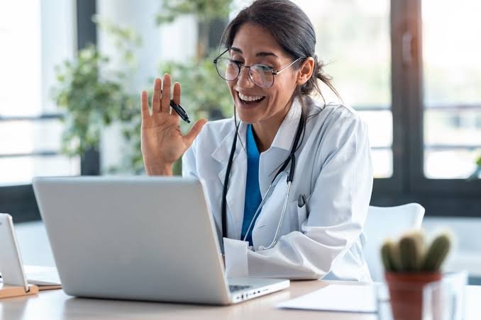 A physician having a remote consultation with a patient.