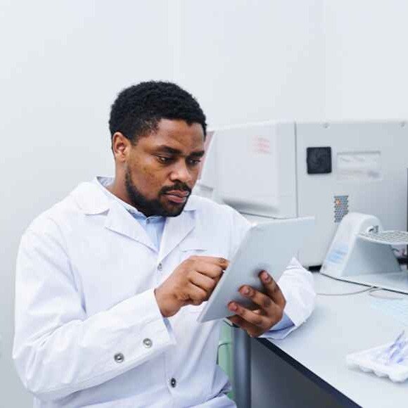 Picture of a health practitioner using a tablet device