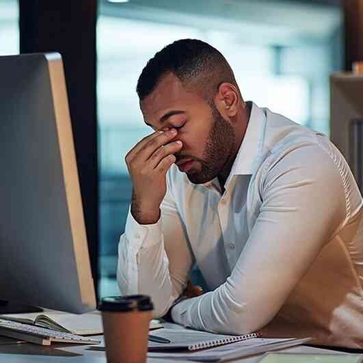 A man who appears to be under stress