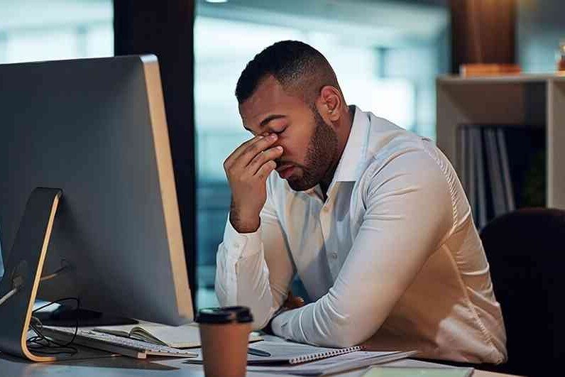 A man who appears to be under stress